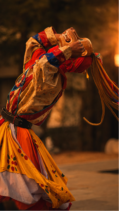 Traditional Bhutanese mask dancer in motion